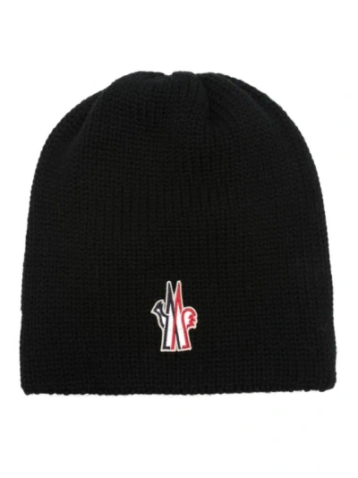 Moncler Logo-embroidered Virgin Wool Beanie In Black