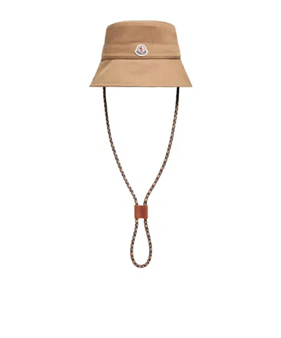 Moncler Logo Patch Drawstring Bucket Hat In Brown