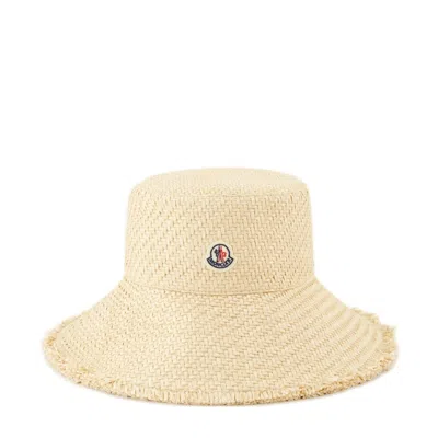 Moncler Logo Patch Fringed Interwoven Hat In Beige