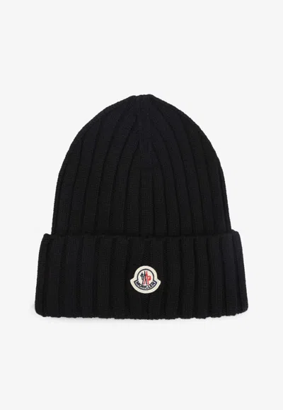 Moncler Logo Patch Knitted Wool Beanie In Black