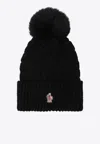 Moncler Wool Hat Featuring Cable Knit And Pom Detail In Black