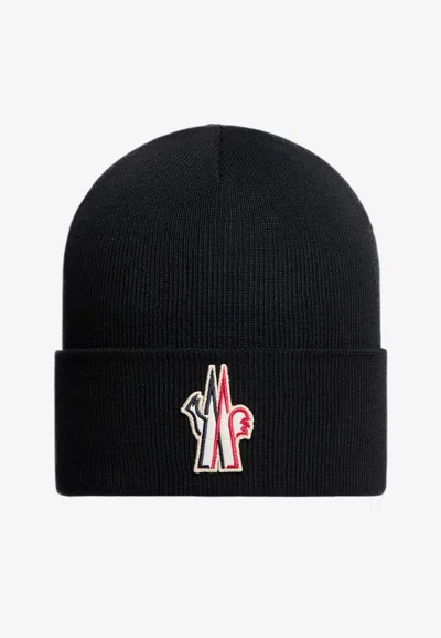 Moncler Logo Patch Ribbed Wool Knit Beanie In Black