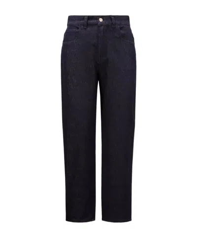 Moncler Logo-patch Tapered-leg Jeans In Blue