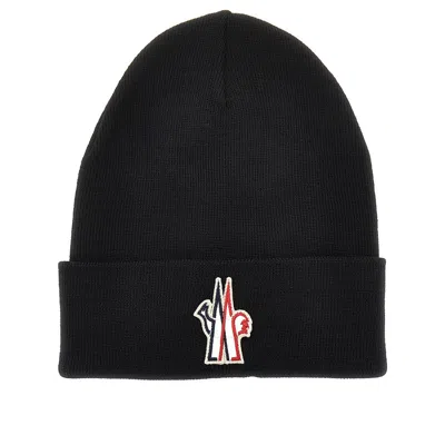 Moncler Logo Patch Wool Beanie Hat In Black