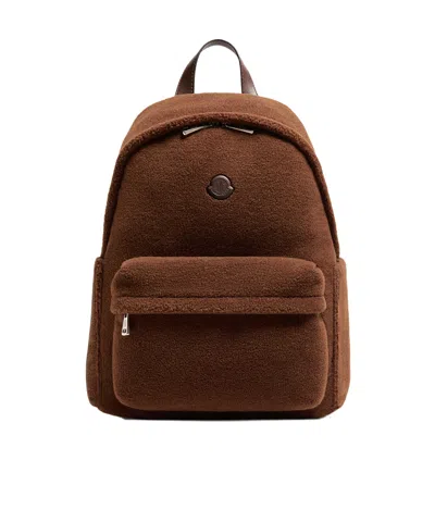 Moncler Logo Patch Zipped Backpack In Brown
