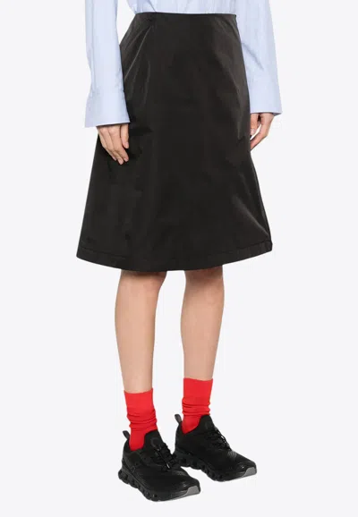 Moncler Logo Patch Zipped Skirt In Black