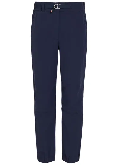 Moncler Logo-appliquéd Stretch-polyamide Trousers In Blue