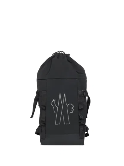 MONCLER LOGO-EMBOSSED DRAWSTRING BACKPACK