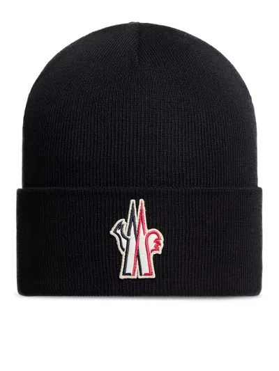 Moncler Logo-embroidered Wool Beanie In Black