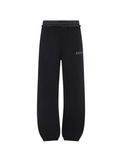 Moncler Logo-embroidered Elasticated-waistband Cotton Track Pants In Black