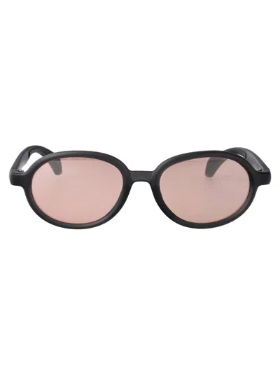 Moncler Matte Transparent Grey Injectate Sunglasses In Black