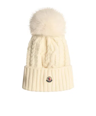 Moncler Pom Pom Embellished Knitted Beanie In Nude