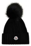 Moncler Ribbed Knit Wool Beanie With Faux Fur Pom-pom In Black