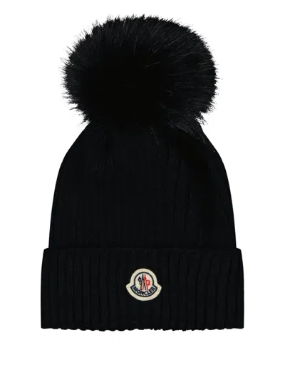 Moncler Ribbed Knit Wool Beanie With Faux Fur Pom-pom In Black