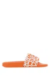 Moncler Round Toe Flat Sole Jeanne Rubber Slippers In Orange