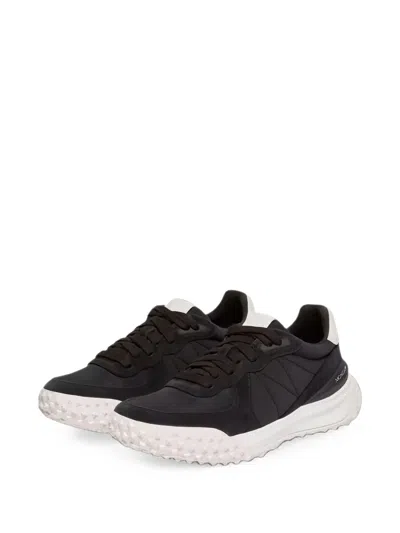 Moncler Quilted Panelled Sneakers In Black