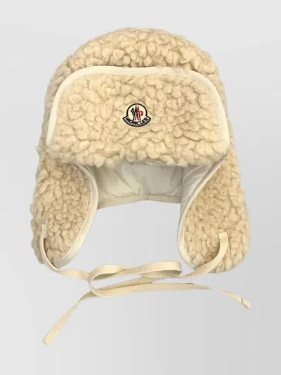 MONCLER REVERSIBLE TEDDY HAT FEATURING EAR FLAPS