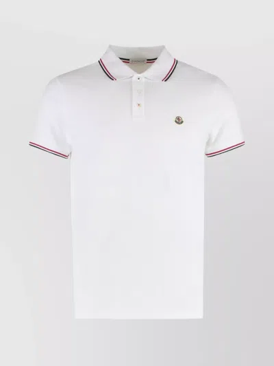 MONCLER RIBBED POLO SHIRT SIDE SLITS
