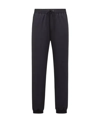 Moncler Rubberised-logo Elasticated-ankles Trousers In Black