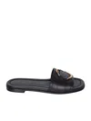 Moncler Black Slides With Distinctive Gold Emblem In Black