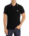 Moncler This Polo Shirt Features A Timeless Design That Transcends The Seasons In Black