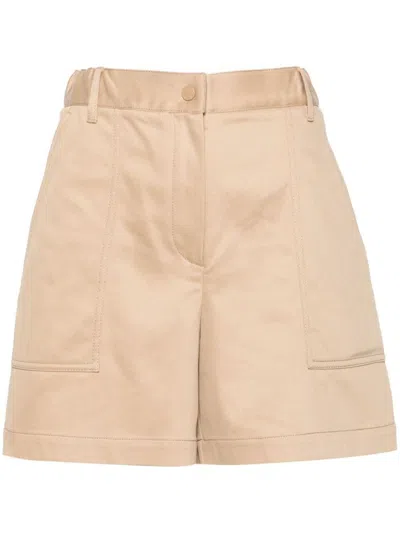 Moncler Logo Patch Pleated Shorts In Beige