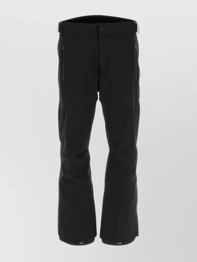 MONCLER STRETCH NYLON SKI TROUSERS WITH FLARED HEM