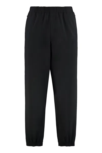 Moncler Stretch Techno Fabric Joggers In Black