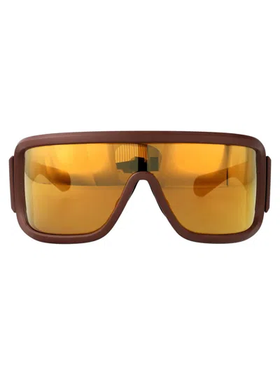 Moncler Sunglasses In Gold