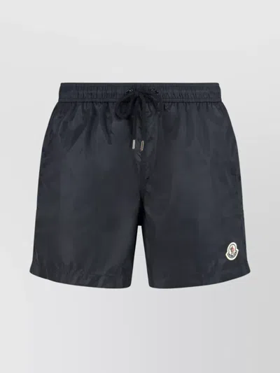 MONCLER SWIM SHORTS WITH ELASTIC WAISTBAND AND POCKETS