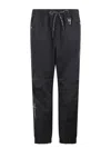 Moncler Logo Embossed Drawstring Track Pants In Black