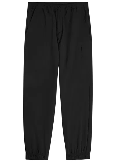 Moncler Tapered-leg Shell Sweatpants In Black