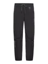Moncler Logo Embossed Drawstring Track Pants In Black