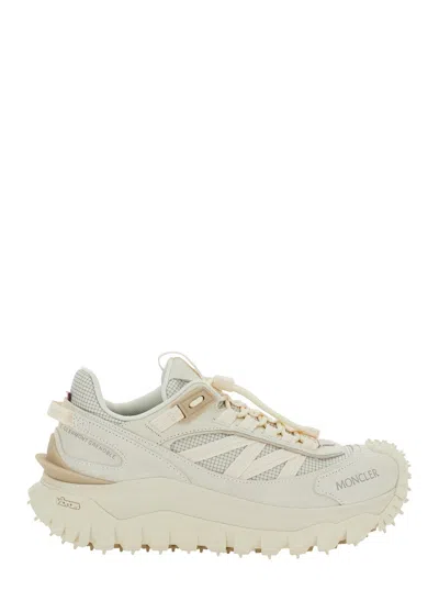 MONCLER MONCLER WOMEN 'TRAILGRIP' WHITE SNEAKERS WITH LOGO LETTERING ON THE SIDE AND LOGO PATCH ON THE TONGU
