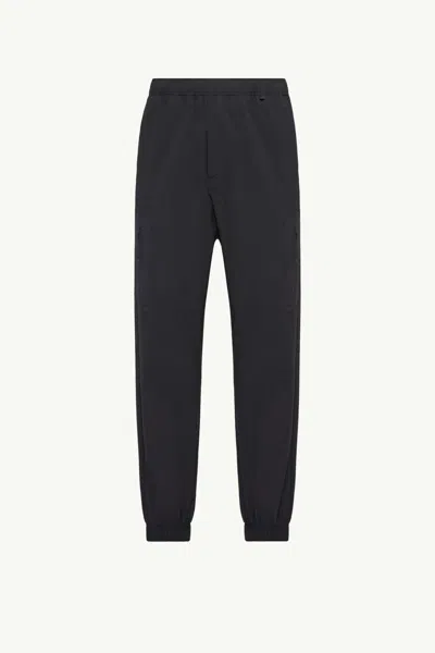 Moncler Stretch Waist Trousers Elastic Cuffs In Black