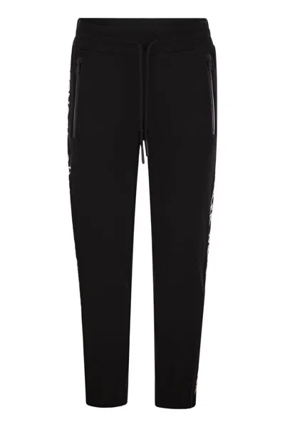 Moncler Men Trousers With Logo In Black