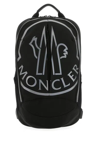 Moncler Logo Print Zipped Backpack In Black