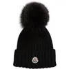 Moncler Ribbed Knit Wool Beanie With Faux Fur Pom-pom In Black