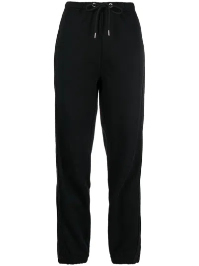 Moncler Panelled Cotton-blend Track Pants In Black
