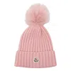 Moncler Virgin Wool Rib Beanie With Faux Fur Pompom In Pink