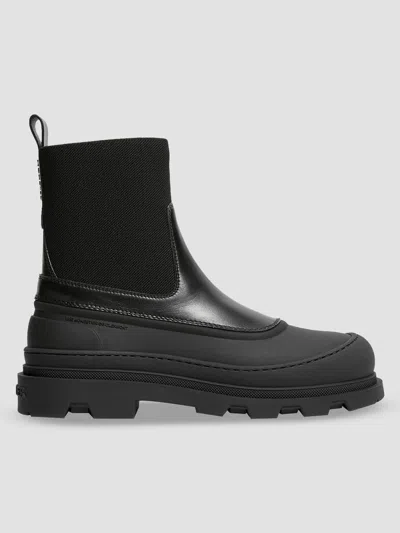 Moncler Vera Edge Rubber-trimmed Leather Ankle Boots In Black