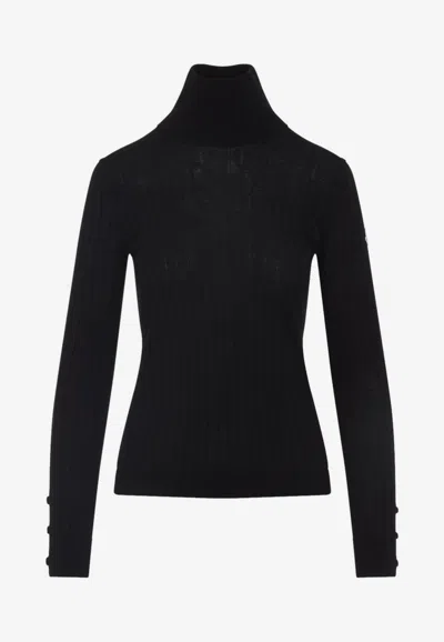 MONCLER WOOL AND CASHMERE TURTLENECK SWEATER