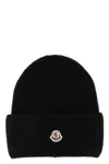 Moncler Ribbed Knit Carded Wool Beanie With Felt Logo Patch In Black