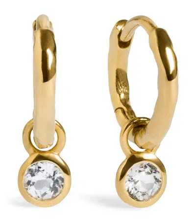 Monica Vinader Gold Vermeil And White Topaz April Birthstone Huggie Earrings In Clear