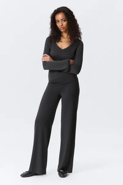 Monki Soft Low Rise Loose Wide Leg Trousers In Black