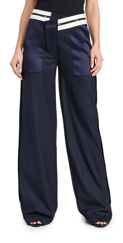 Monse Inside Out Tailored Wide Leg Wool Trousers In Midnight