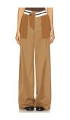 Monse Inside Out Trousers In Brown