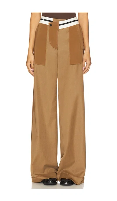 Monse Inside Out Trousers In Brown