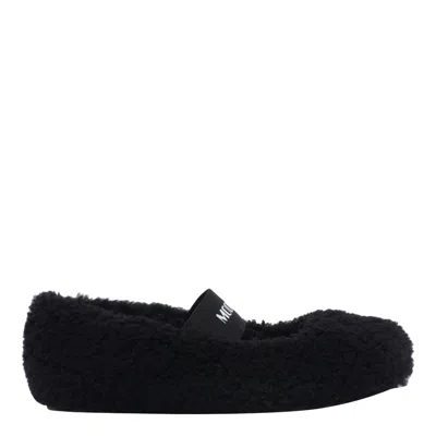 Moon Boot Shearling Flats In Black