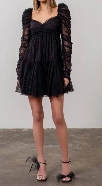 MOON RIVER RUCHED DETAIL LONG SLEEVE DRESS IN BLACK